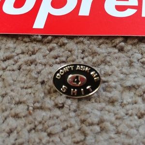 Supreme pin